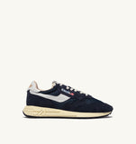 Sneakers Autry Reelwind bleu marine et beige en daim, style rétro homme, dispo à Versailles