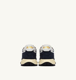 Vue arrière des Autry Reelwind bleu marine et beige, sneakers homme look vintage, dispo boutique Versailles. seeyoustore