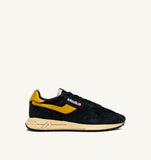 Sneakers Autry Reelwind noires et jaunes en mesh et daim, look rétro homme, dispo boutique Versailles