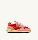 Sneakers Autry Reelwind rose rouge et orange en daim et mesh, homme tendance, dispo à Versailles.