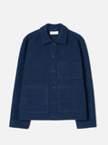 Veste uniforme Universal Works en polaire de laine bleu marine avec col, boutons et poches.