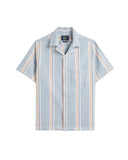 Chemise Radi Portuguese Flannel, chemise à manches courtes bleu clair avec col camp. Rayures verticales blanches, orange et gris.