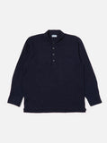 Pullover LS Shirt Indigo Navy Universal Works, coupe décontractée et col chemise. Confectionné en coton indigo de haute qualité pour un confort optimal. Teinte bleu marine profonde, idéale pour un style casual élégant. Disponible dans notre concept store homme à Versailles.