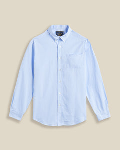 Chemise ATLANTICO à rayures bleu en seersucker – Portuguese Flannel. Coupe droite, tissu gaufré respirant, parfaite pour l'été. Disponible chez SEE YOU, concept store masculin à Versailles.