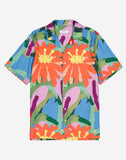 Chemise Aloha Wildflowers OLOW, une pièce estivale à l’imprimé floral vibrant. Confectionnée en coton biologique pour un toucher doux et une excellente respirabilité. Son col cubain et sa coupe fluide en font un essentiel du vestiaire casual chic. Disponible en boutique chez SEE YOU, concept store à Versailles.