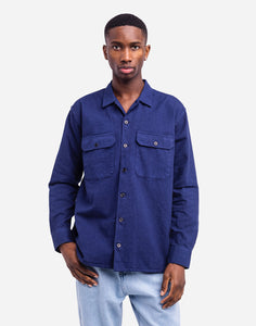 OLOW Chemise Decre Taza Skome Blue – Élégance et confort avec une coupe fluide et un design original.
