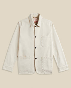 Veste Labura Portuguese Flannel en coton écru – coupe droite inspirée du workwear, trois poches plaquées et tissu naturel de qualité. Une pièce minimaliste et élégante, disponible chez SEE YOU, concept store à Versailles.