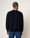 Vue de dos du Sweatshirt Aquae Navy HOMECORE, montrant la couture verticale rouge au dos du vêtement.
