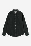 Chemise Madison Cord Raven Carhartt WIP en velours côtelé vert foncé, manches longues, col boutonné, logo brodé.